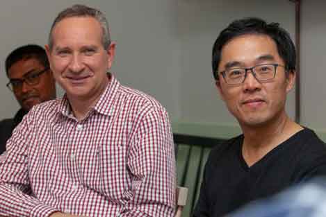 three people looking at the camera