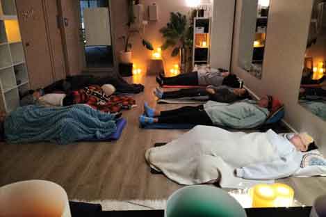 people laying in a studio