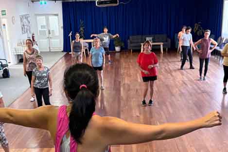 instructor teaching dance