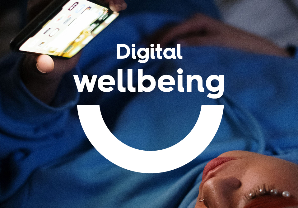 person holding a phone and the word Digital Wellbeing