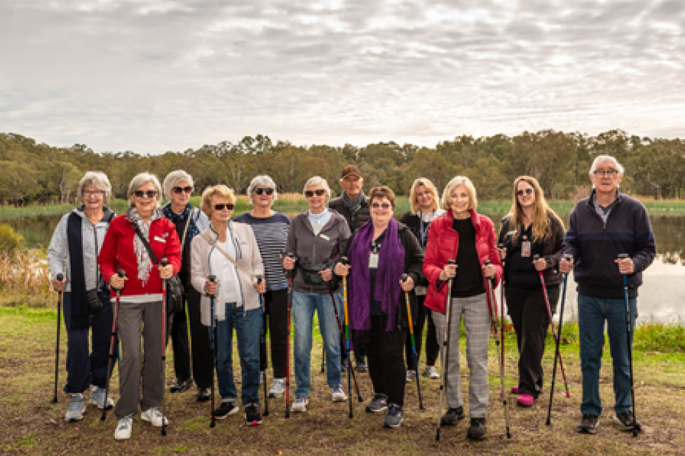 group of people standing together outside 